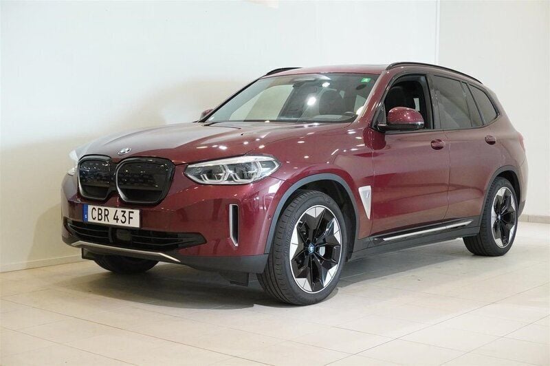 Röd/orange Begagnad 2021 BMW iX3 Shadowline SUV | 458 500 kr (Marknadspris) - Bild 1/4