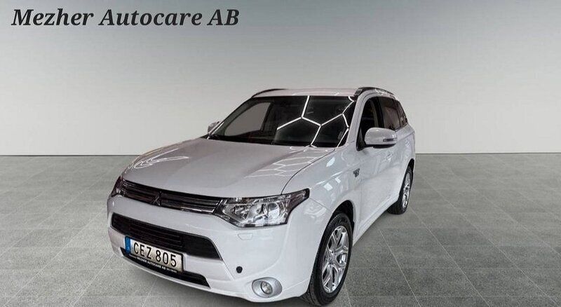 Vit Begagnad 2014 Mitsubishi Outlander P-HEV SUV | 165 000 kr (Marknadspris) - Bild 1/4