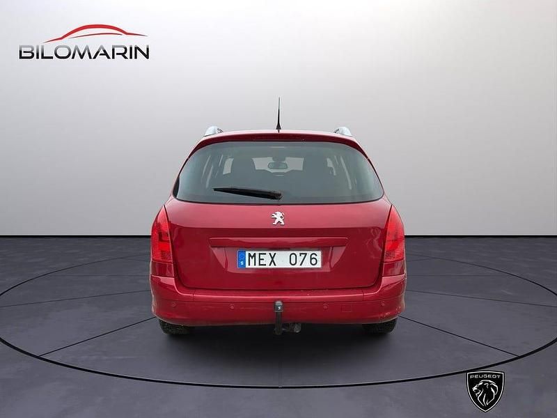 Begagnad Peugeot 308 112 HK (82 kW) 2012 Röd metallic Kombi