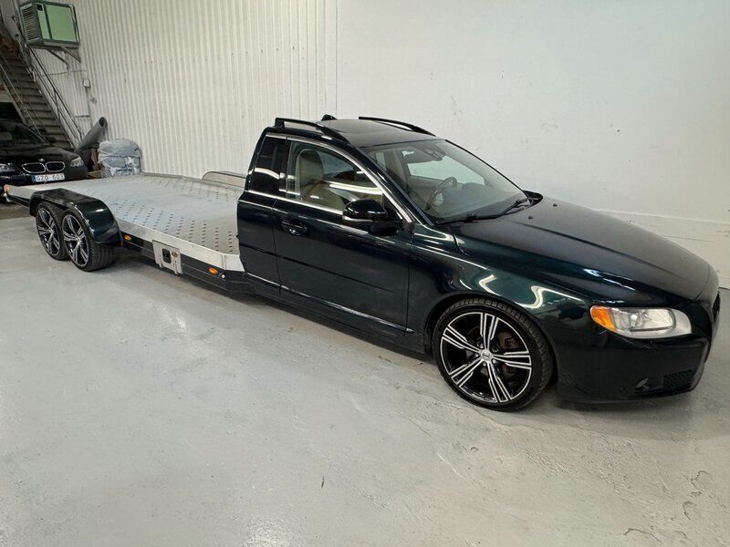 Mörkgrön (grönmetallic) Begagnad 2012 Volvo V70 Summum Kombi | 373 750 kr - Bild 1/4