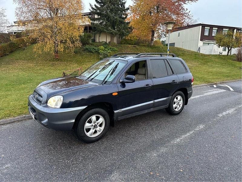 Blå Begagnad 2005 Hyundai Santa Fe GLS SUV | 21 500 kr (Marknadspris) - Bild 1/4