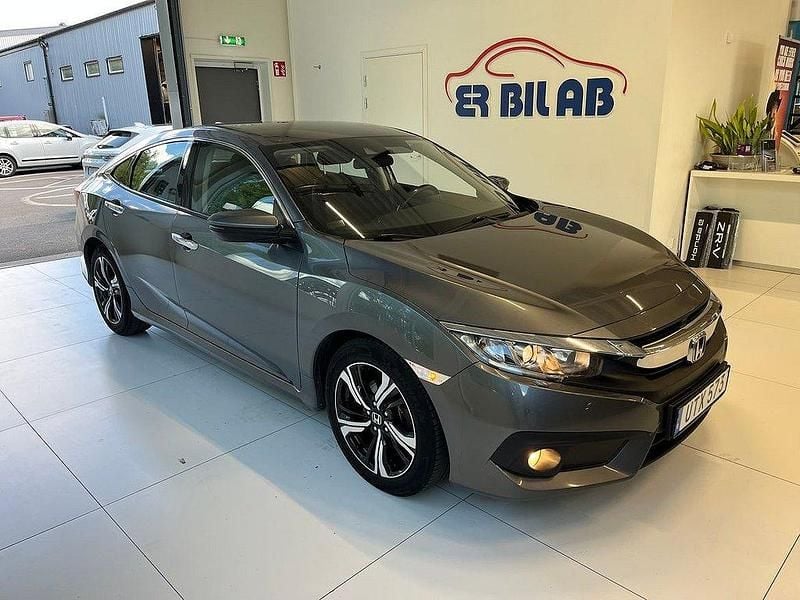 Mörkgrå (grå) Begagnad 2018 Honda Civic Elegance Sedan | 134 900 kr (Lite dyr) - Bild 1/4