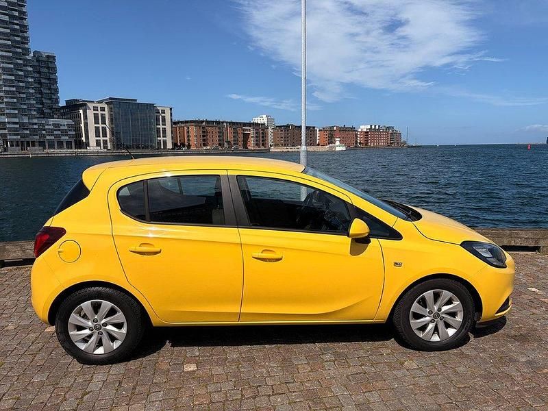 Gul Begagnad 2015 Opel Corsa Enjoy Halvkombi | 68 800 kr (Marknadspris) - Bild 1/4