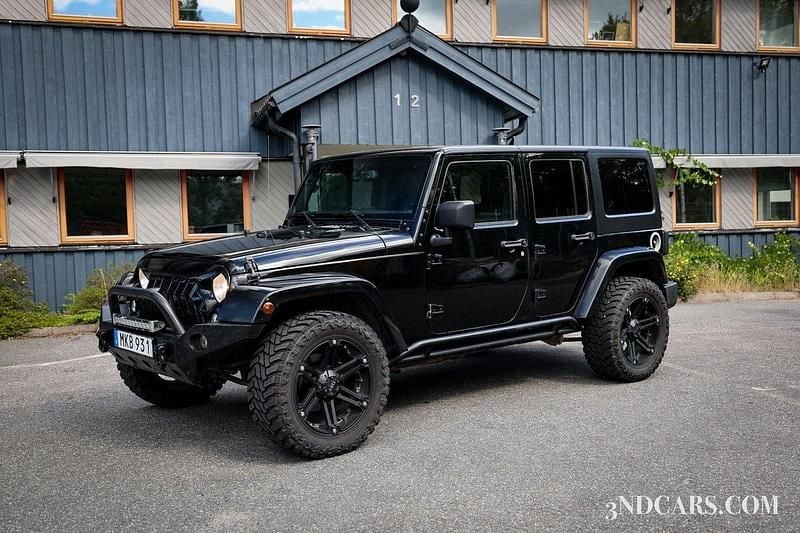 Svart Begagnad 2015 Jeep Wrangler Unlimited SUV | 279 900 kr (Marknadspris) - Bild 1/4
