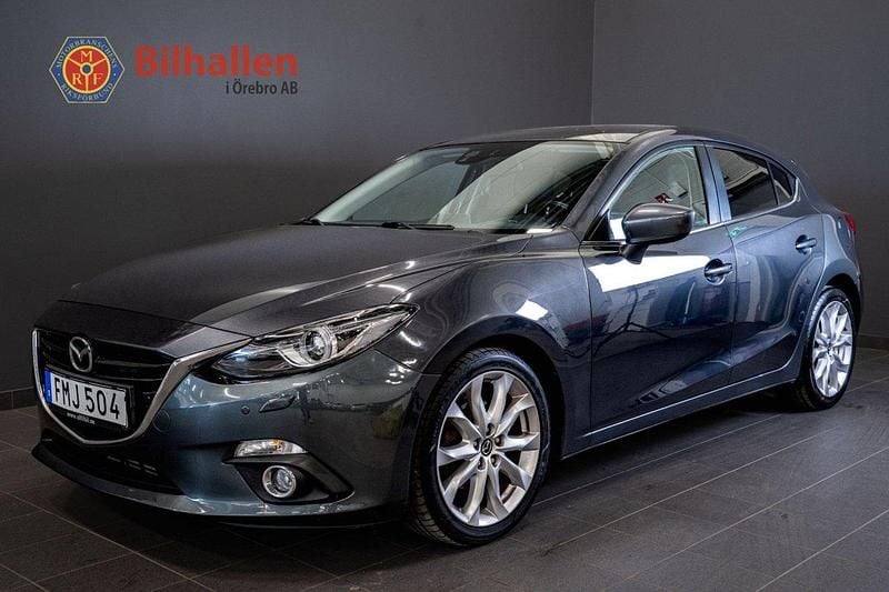 Grå Begagnad 2014 Mazda 3 Inclusive Halvkombi | 124 900 kr (Marknadspris) - Bild 1/4