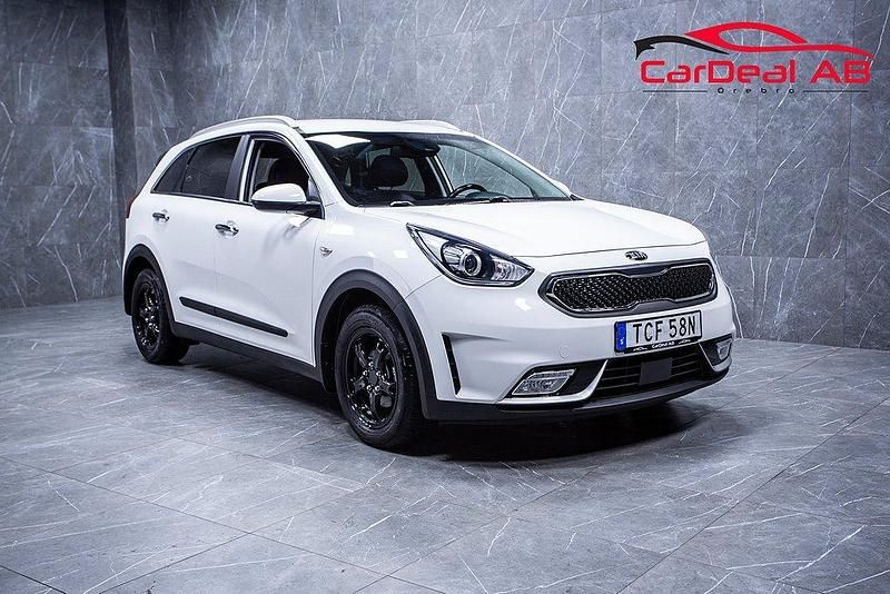 Vit Begagnad 2019 Kia Niro Advance SUV | 173 800 kr (Marknadspris) - Bild 1/4