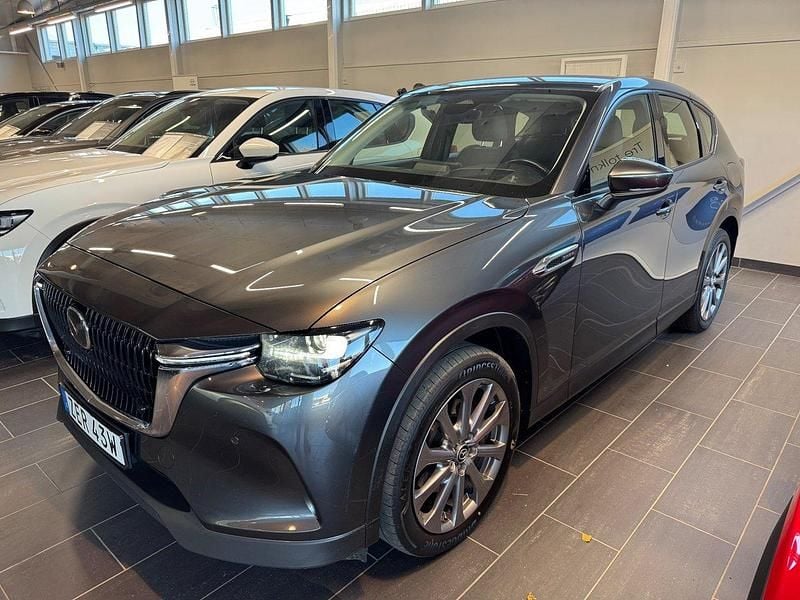 Grå (machine grey) Begagnad 2023 Mazda CX-60 Comfort SUV | 389 900 kr (Marknadspris) - Bild 1/4