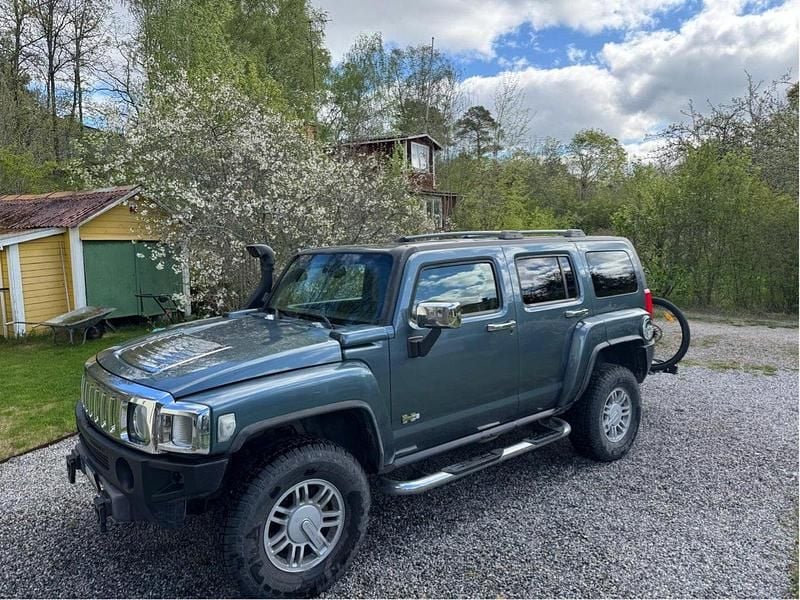 Blå Begagnad 2006 Hummer H3 SUV | 100 000 kr - Bild 1/4