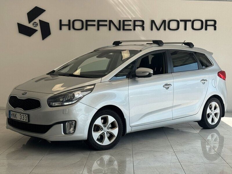 Grå Begagnad 2013 Kia Carens Minibuss | 69 000 kr (Marknadspris) - Bild 1/4