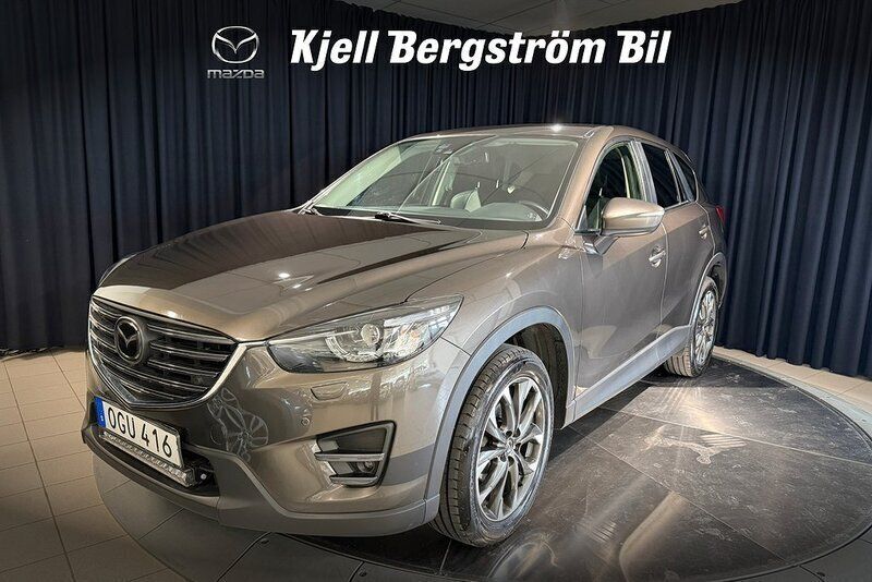 Brun metallic Begagnad 2016 Mazda CX-5 SUV | 187 000 kr (Marknadspris) - Bild 1/4