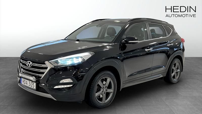 Svart (black) Begagnad 2015 Hyundai Tucson Premium SUV | 169 900 kr - Bild 1/4