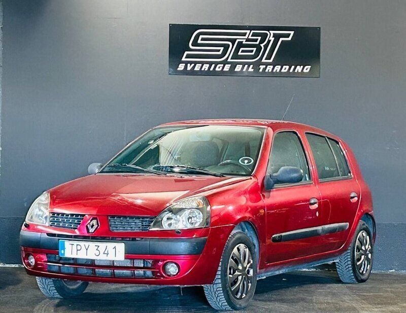 Mörkröd (röd) Begagnad 2003 Renault Clio II Expression Halvkombi | 19 900 kr (Marknadspris) - Bild 1/4