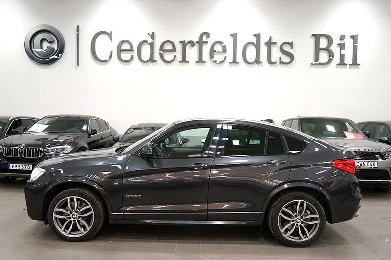 Grå Begagnad 2016 BMW X4 M Sport SUV | 239 900 kr (Marknadspris) - Bild 1/4