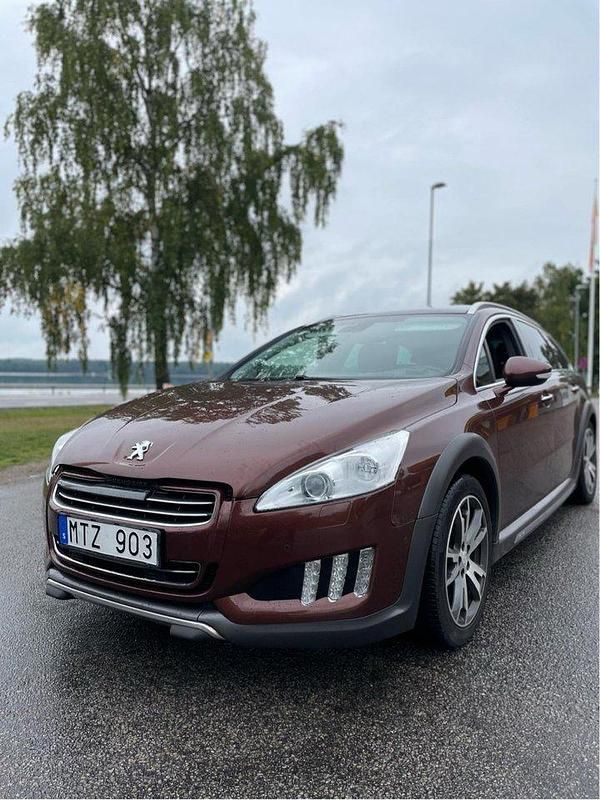 Brun Begagnad 2012 Peugeot 508 RXH Kombi | 74 750 kr (Marknadspris) - Bild 1/4