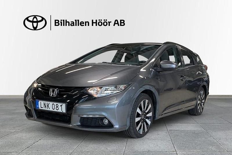 Mörkgrå Begagnad 2014 Honda Civic Elegance Kombi | 139 900 kr (Marknadspris) - Bild 1/3