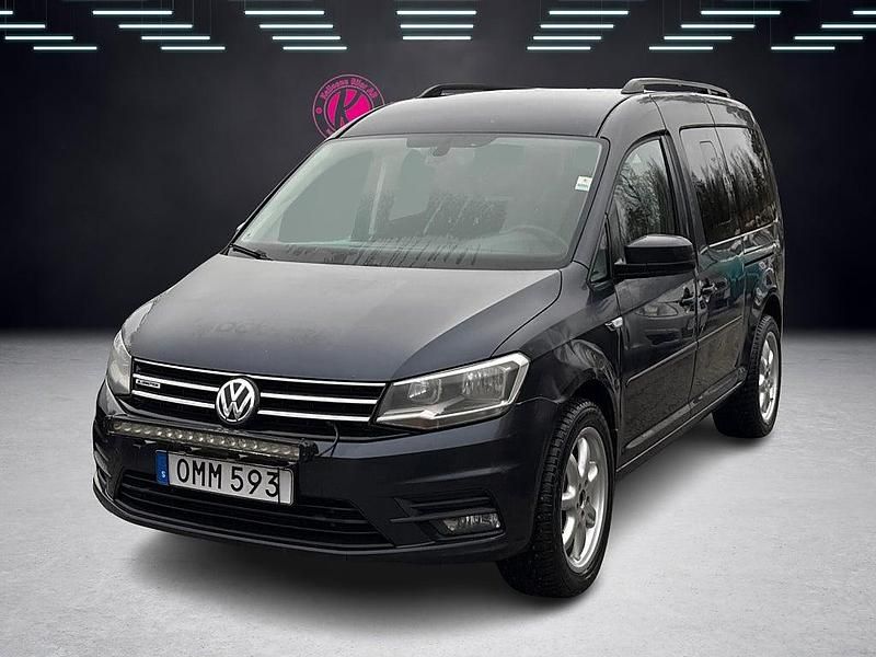 Mörkblå Begagnad 2015 VW Caddy Maxi Life Life Minibuss | 64 900 kr - Bild 1/4