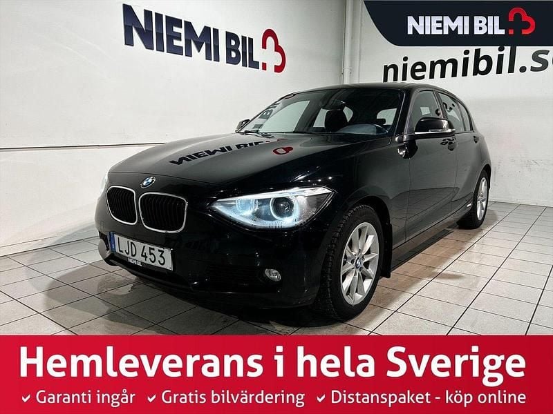 Svart Begagnad 2014 BMW 120 Halvkombi | 114 900 kr (Marknadspris) - Bild 1/3