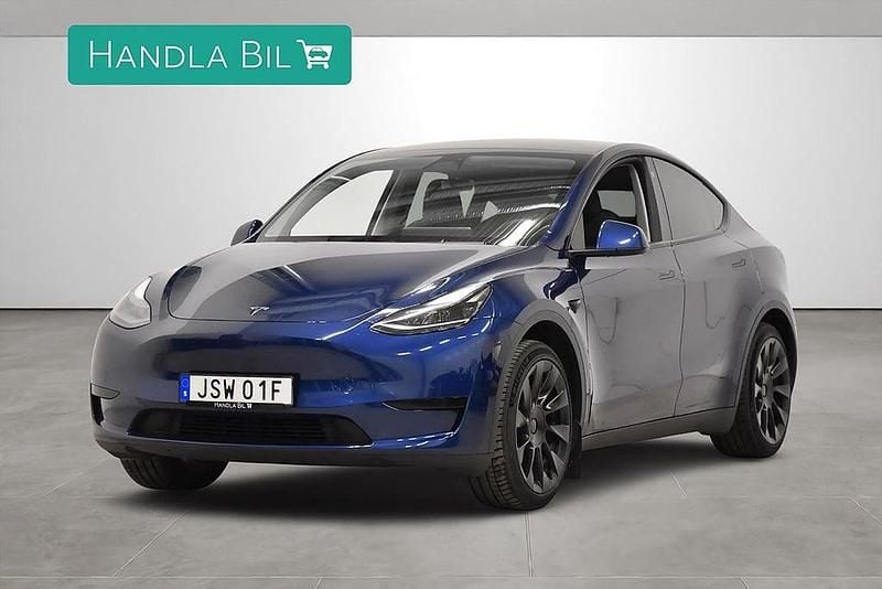 Blå Begagnad 2024 Tesla Model Y Long Range RWD SUV | 449 900 kr (Marknadspris) - Bild 1/4