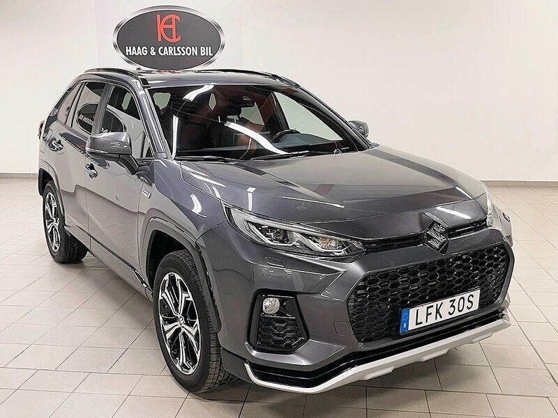 Grå Begagnad 2021 Suzuki Across SUV | 349 000 kr - Bild 1/4