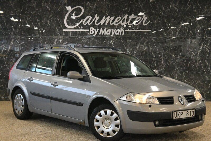Ljusgrå (grå) Begagnad 2004 Renault Mégane GrandTour Kombi | 19 990 kr (Lite dyr) - Bild 1/4