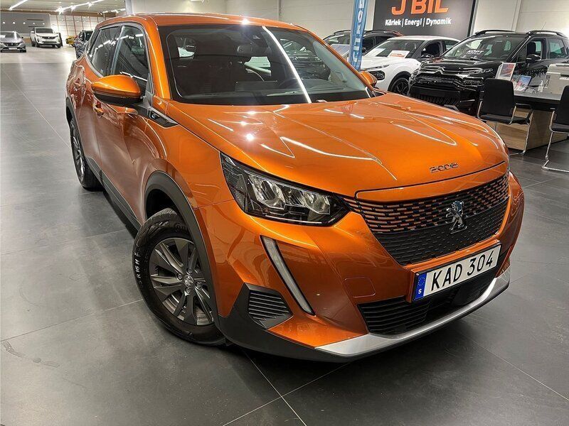 Orange Begagnad 2021 Peugeot e-2008 Active SUV | 189 900 kr (Marknadspris) - Bild 1/4