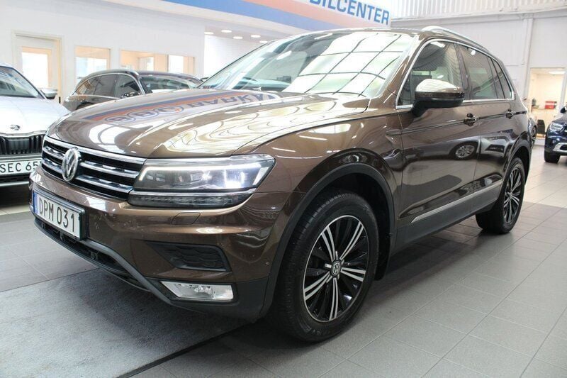 Mörkbrun Begagnad 2016 VW Tiguan GT SUV | 174 900 kr (Marknadspris) - Bild 1/4