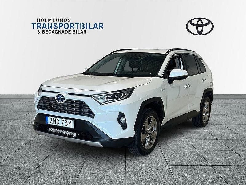 Vit Begagnad 2020 Toyota RAV4 Hybrid Executive SUV | 339 900 kr (Marknadspris) - Bild 1/4