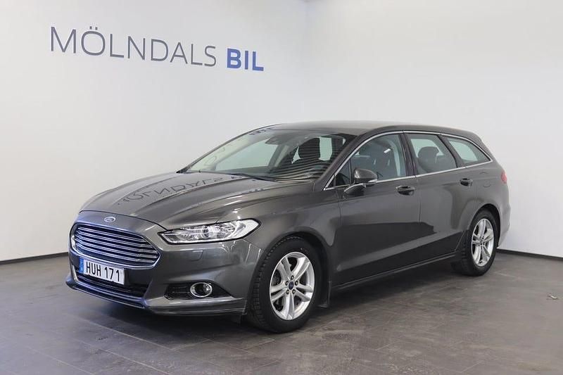 Grå Begagnad 2015 Ford Mondeo Titanium Kombi | 79 900 kr (Marknadspris) - Bild 1/4