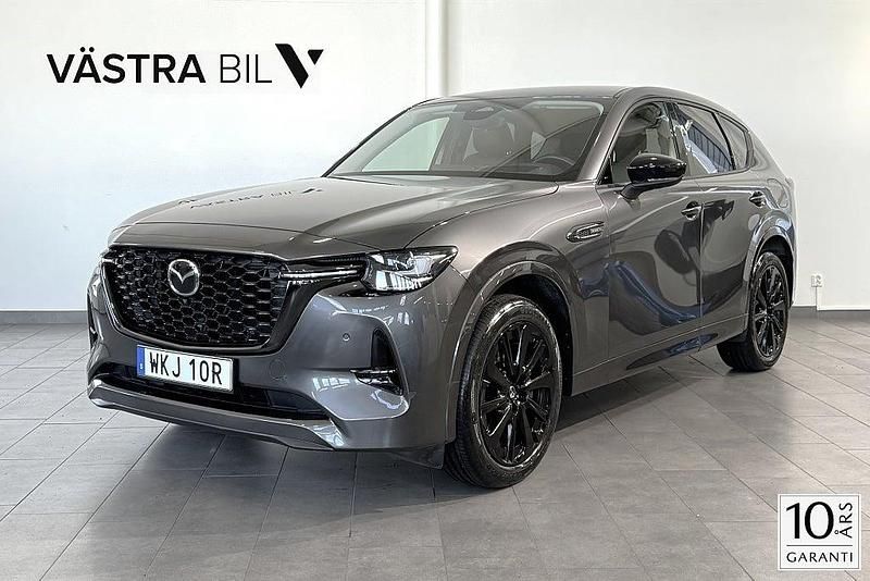 Grå Begagnad 2022 Mazda CX-60 Homura-Line SUV | 429 900 kr (Marknadspris) - Bild 1/4