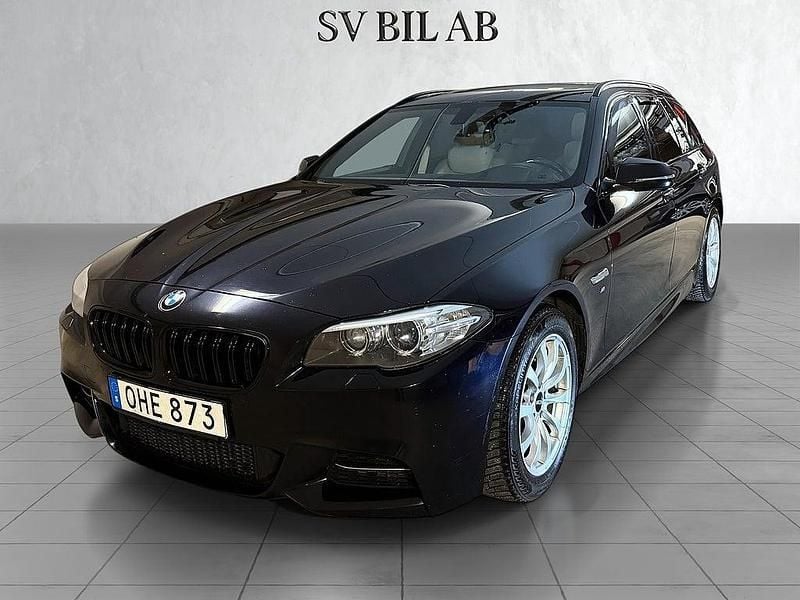 Svart Begagnad 2016 BMW 520 M Sport Kombi | 191 900 kr (Bra pris) - Bild 1/4