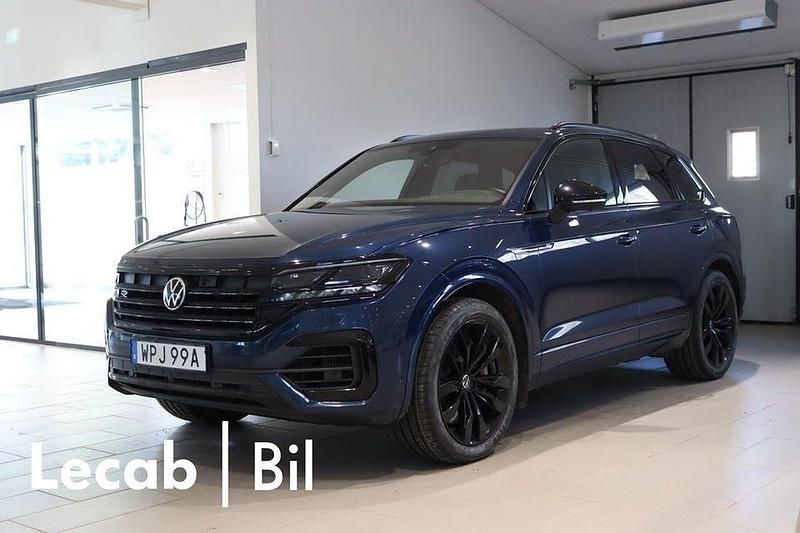 Aquamarine metallic Begagnad 2021 VW Touareg R SUV | 559 500 kr (Bra pris) - Bild 1/4