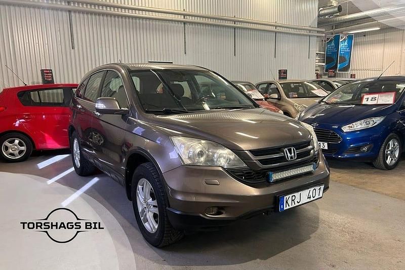 Grå Begagnad 2010 Honda CR-V SUV | 59 900 kr (Marknadspris) - Bild 1/4