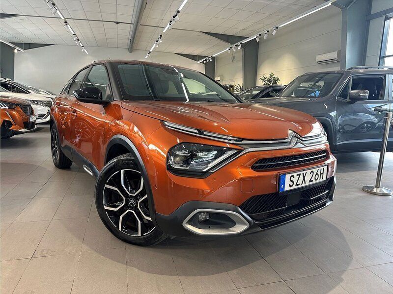 Orange Begagnad 2022 Citroën e-C4 Shine Halvkombi | 219 900 kr (Bra pris) - Bild 1/4