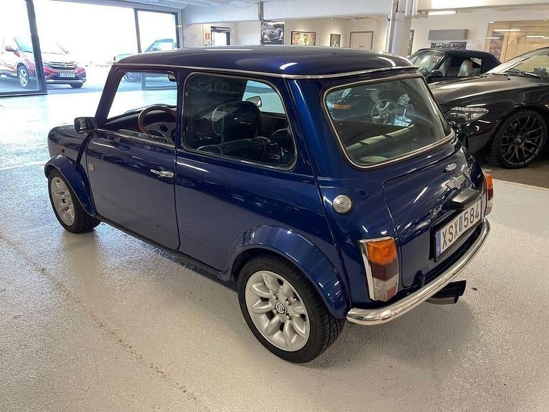 Begagnad Mini Cooper 63 HK (46 kW) 1996 Blåmetallic Halvkombi