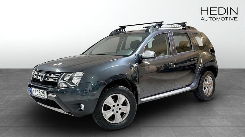 Mörkgrå (grey) Begagnad 2015 Dacia Duster SUV | 114 900 kr (Marknadspris) - Bild 1/4