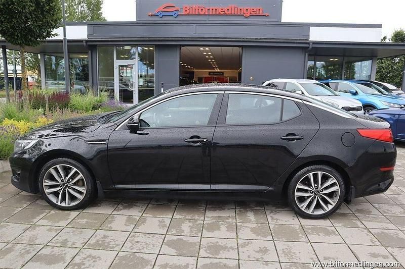 Svart Begagnad 2014 Kia Optima Sedan | 94 900 kr (Marknadspris) - Bild 1/4