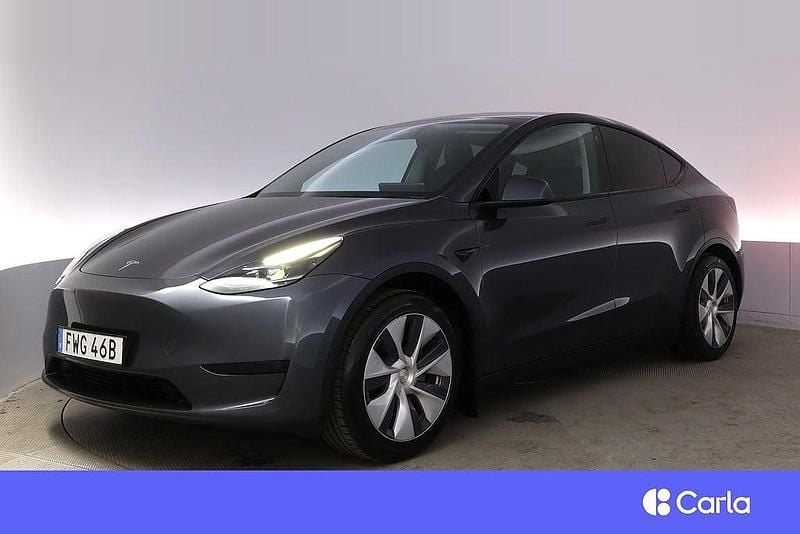 Grå Begagnad 2022 Tesla Model Y Standard Range SUV | 387 900 kr (Dyr) - Bild 1/4