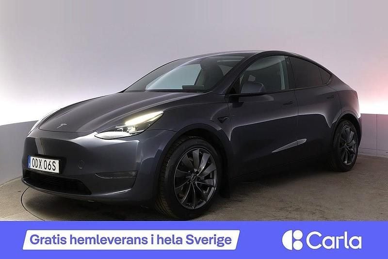 Grå Begagnad 2023 Tesla Model Y Long Range AWD SUV | 439 990 kr (Marknadspris) - Bild 1/2