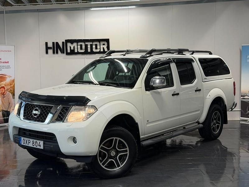 Vit Begagnad 2011 Nissan Navara Pickup | 119 900 kr (Marknadspris) - Bild 1/4