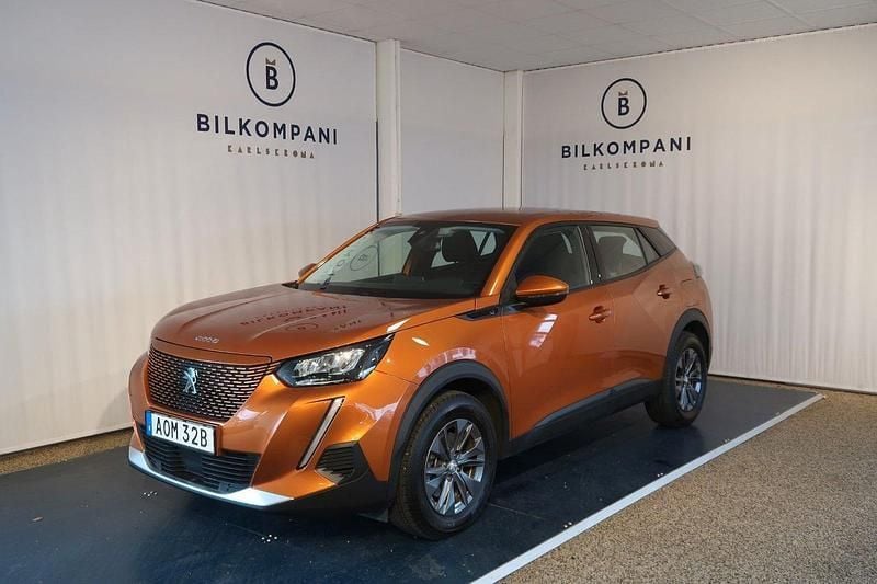 Orange (orange fusion) Begagnad 2021 Peugeot e-2008 SUV | 174 800 kr (Marknadspris) - Bild 1/4