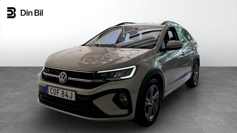 Grå (ascot grey) Begagnad 2022 VW Taigo R-line SUV | 239 900 kr (Marknadspris) - Bild 1/4