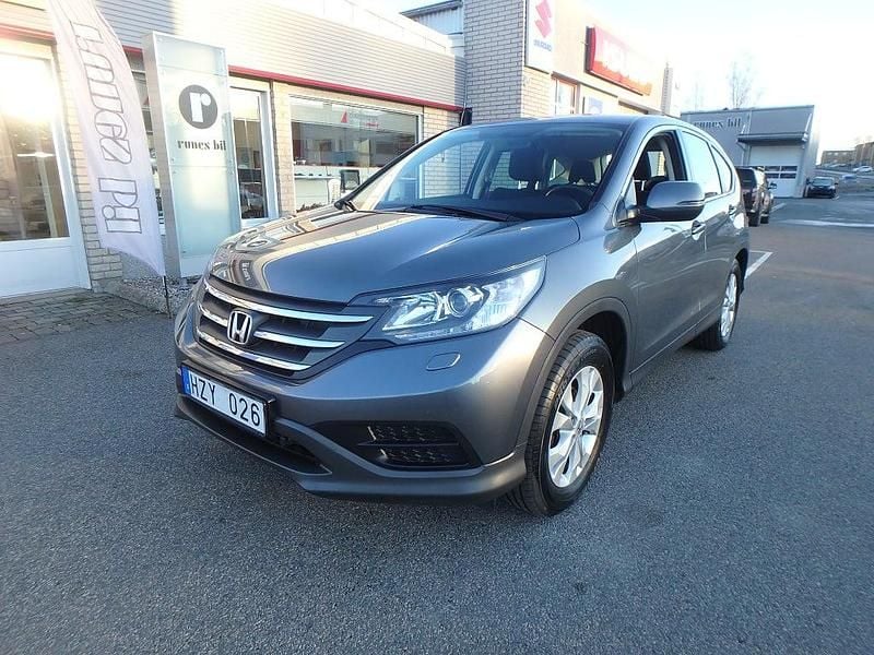 Grå Begagnad 2013 Honda CR-V SUV | 123 900 kr (Marknadspris) - Bild 1/4