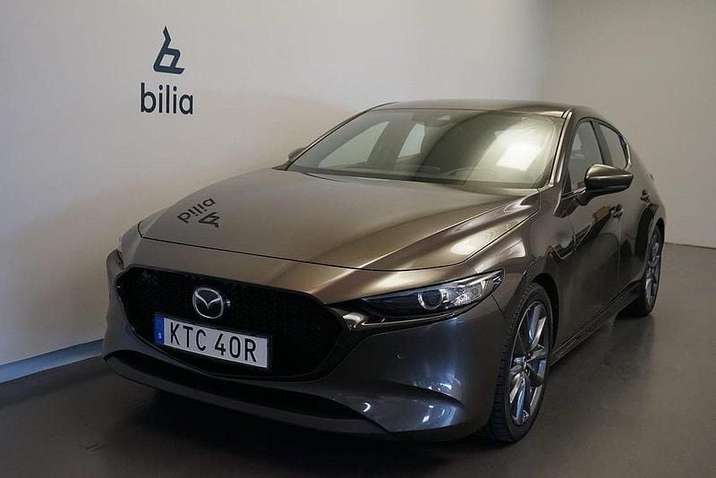 Brun Begagnad 2018 Mazda 3 Sky Halvkombi | 184 500 kr (Marknadspris) - Bild 1/4