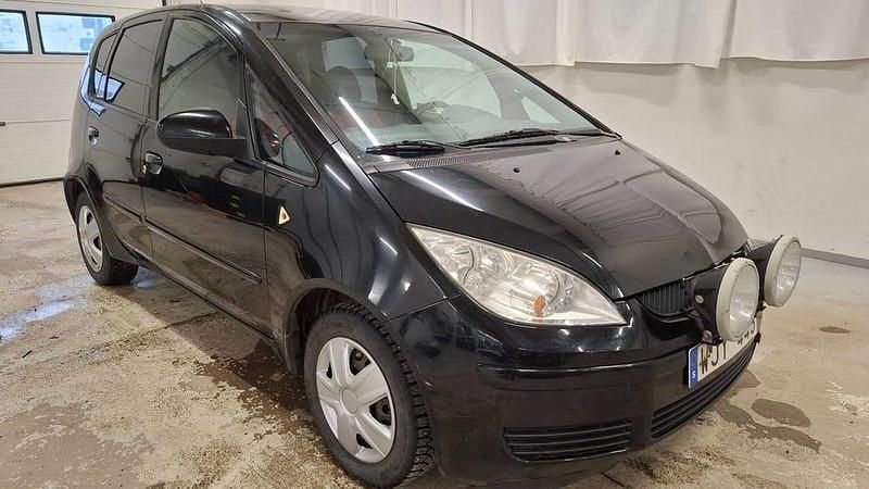 Svart Begagnad 2005 Mitsubishi Colt Halvkombi | 14 900 kr (Marknadspris) - Bild 1/4