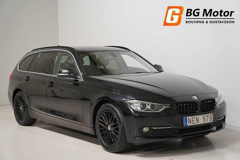 Svart Begagnad 2012 BMW 320 Luxury Line Kombi | 124 900 kr (Lite dyr) - Bild 1/3