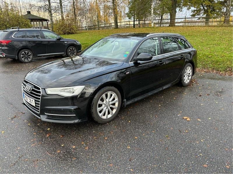 Svart Begagnad 2016 Audi A6 Ambition Kombi | 129 900 kr (Marknadspris) - Bild 1/4