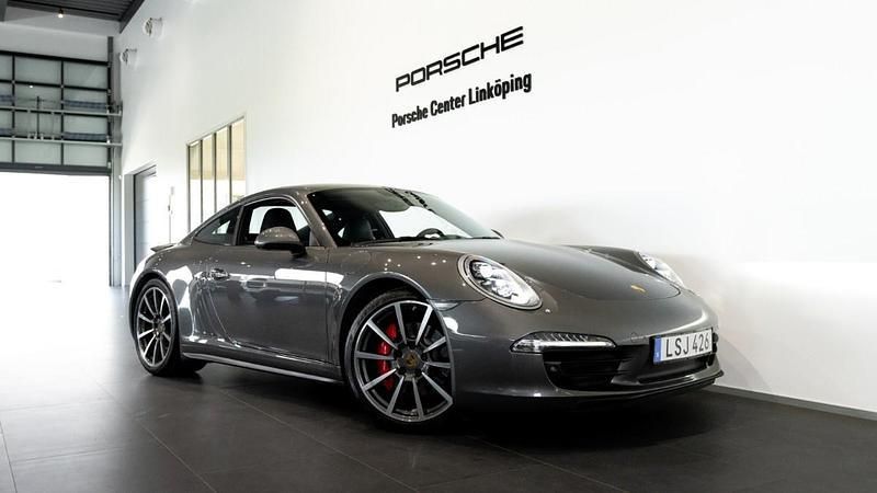 Mörkgrå (grey) Begagnad 2015 Porsche 911 Carrera 4S Sportkupé | 1 149 000 kr (Marknadspris) - Bild 1/4