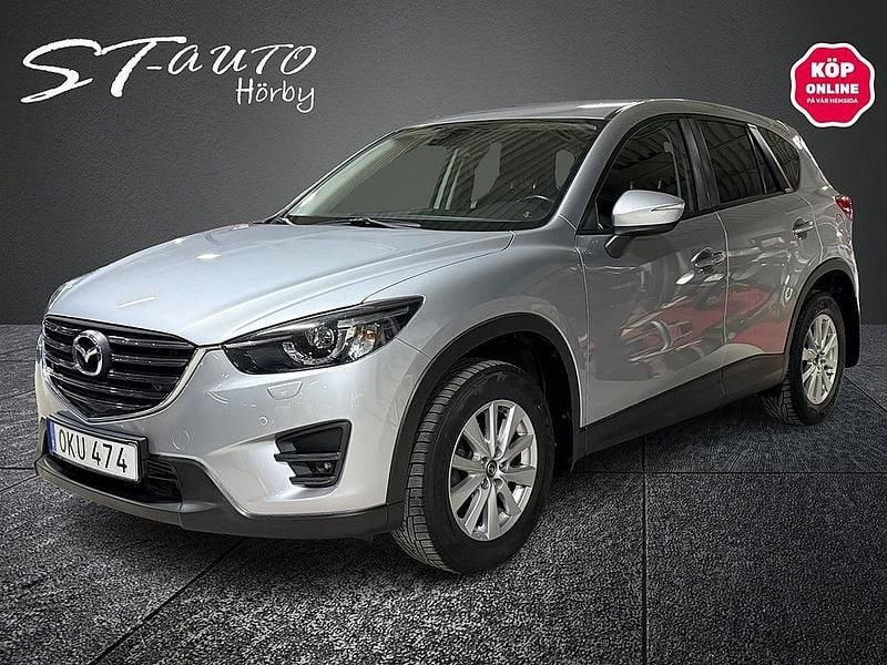 Grå metallic Begagnad 2016 Mazda CX-5 SUV | 159 900 kr (Marknadspris) - Bild 1/4