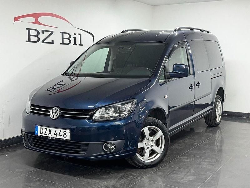 Mörkblå Begagnad 2014 VW Caddy Maxi Life Life Minibuss | 189 900 kr (Bra pris) - Bild 1/4