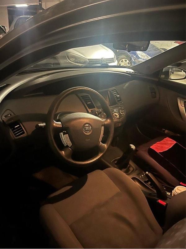 Brun Begagnad 2006 Nissan Primera Kombi | 13 000 kr (Marknadspris) - Bild 1/4